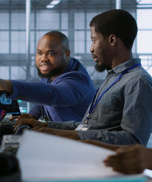 Data center engineers maintaining company network infrastructure by installing, configuring, troubleshooting and repairing hardware. Server hub workers ensuring optimal system performance, camera A
